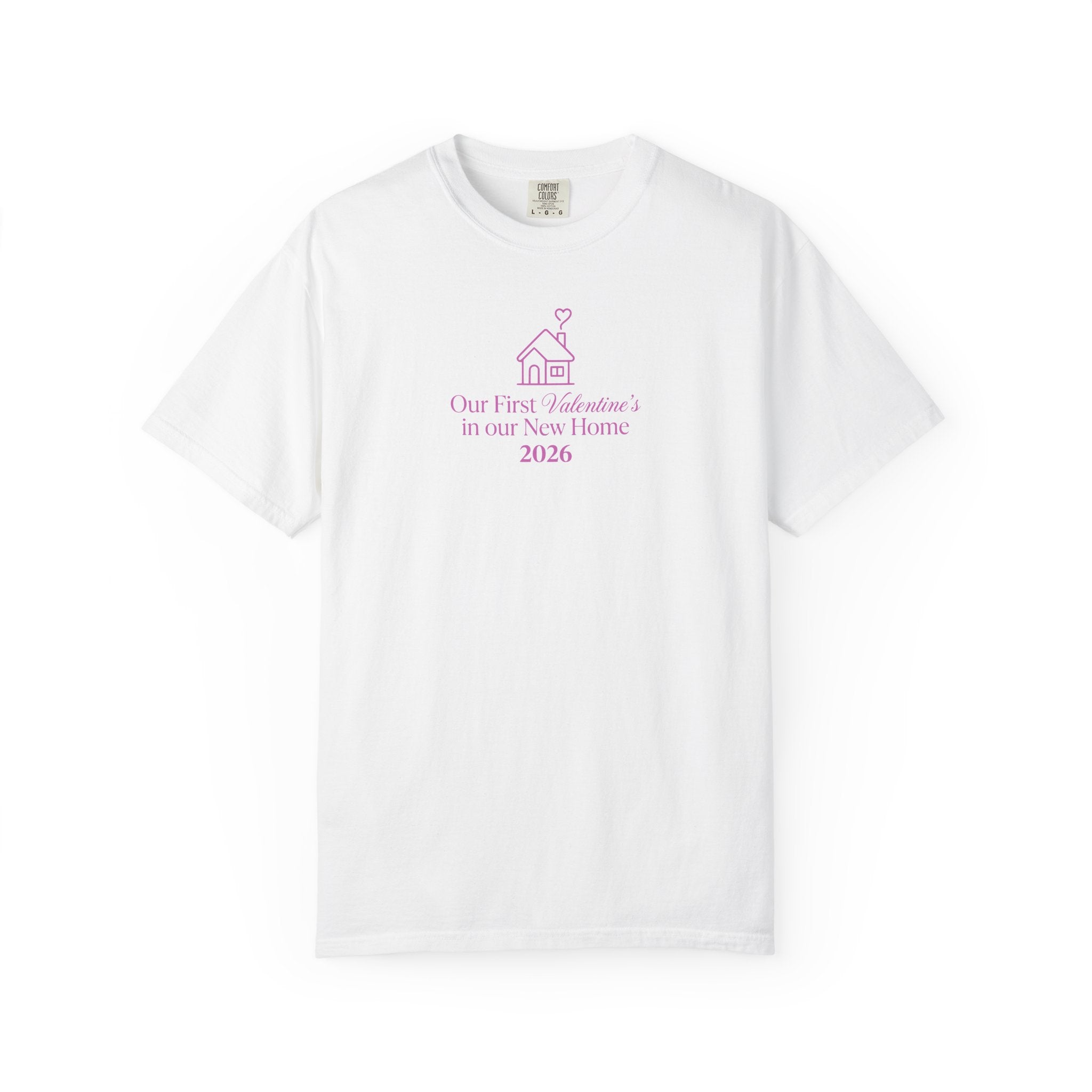 "Our First Valentine's in our New Home 2026 t-shirt, minimalist house graphic with heart smoke, printed on a cream Comfort Colors 1717 garment-dyed shirt."